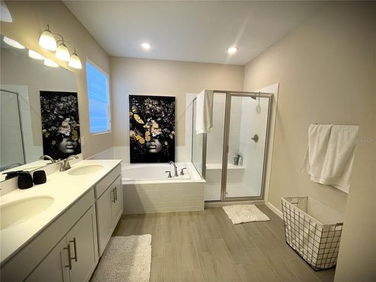 Bathroom, Dual Sink Vanities, Glass Shower, Interior, Recessed Lighting, Wood Texture Flooring