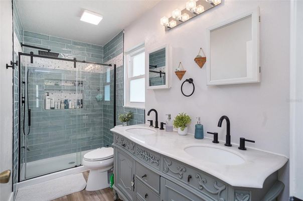 Bathroom, Dual Sink Vanities, Glass Shower, Interior, Wood Texture Flooring