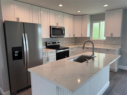 Interior, Kitchen, Recessed Lighting, Stainless Steel Appliances, Wood Texture Flooring