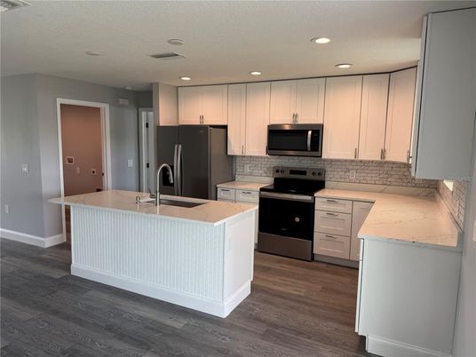 Interior, Kitchen, Recessed Lighting, Stainless Steel Appliances, Wood Texture Flooring