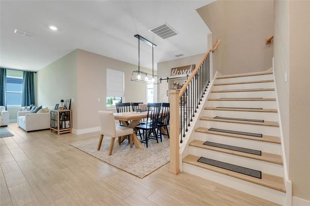 Dining room, Interior, Living room, Pendant Lights, Recessed Lighting, Wood Texture Flooring