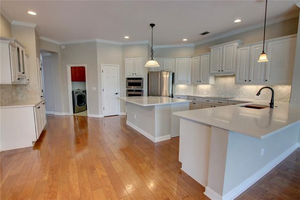 Interior, Kitchen, Pendant Lights, Recessed Lighting, Stainless Steel Appliances, Washer, Wood Texture Flooring