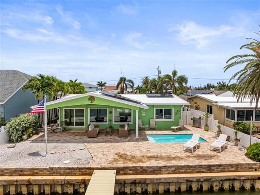 Exterior, Pool, Solar Panels