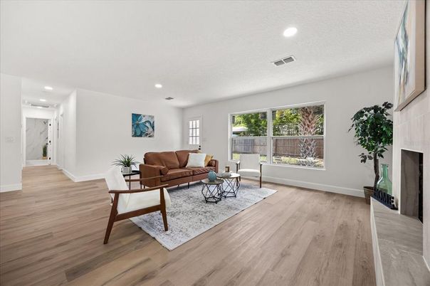 Fireplace, Interior, Living room, Recessed Lighting, Wood Texture Flooring