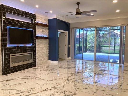 Empty room, Fireplace, Interior, Marble, Recessed Lighting, Stone Walls