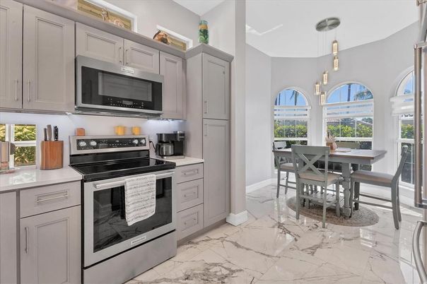 Dining room, Interior, Kitchen, Marble, Pendant Lights, Stainless Steel Appliances