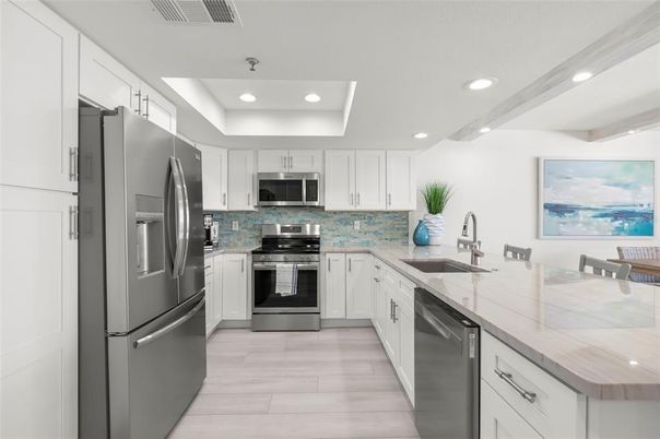 Interior, Kitchen, Recessed Lighting, Stainless Steel Appliances, Wood Texture Flooring