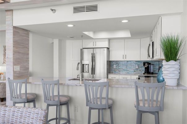 Interior, Kitchen, Recessed Lighting, Stainless Steel Appliances, Tile Countertops