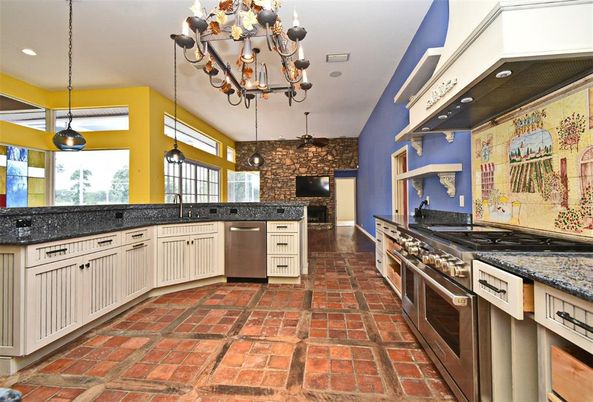 Fireplace, Interior, Kitchen, Pendant Lights, Recessed Lighting, Stainless Steel Appliances, Stone Walls
