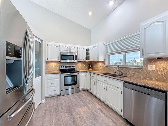 Interior, Kitchen, Recessed Lighting, Stainless Steel Appliances, Wood Texture Flooring