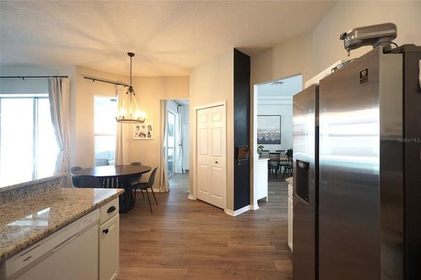 Dining room, Interior, Kitchen, Pendant Lights, Stainless Steel Appliances, Wood Texture Flooring