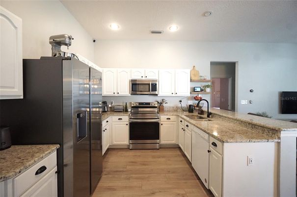 Interior, Kitchen, Recessed Lighting, Stainless Steel Appliances, Wood Texture Flooring