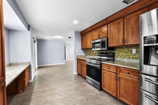 Interior, Kitchen, Recessed Lighting, Stainless Steel Appliances, Wood Texture Flooring