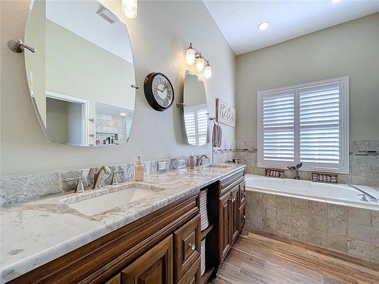Bathroom, Dual Sink Vanities, Interior, Recessed Lighting, Wood Texture Flooring