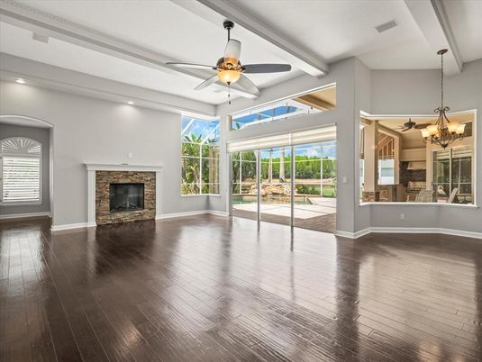 Chandelier, Empty room, Fireplace, Interior, Recessed Lighting, Wood Texture Flooring