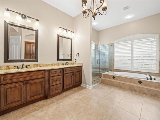 Bathroom, Chandelier, Dual Sink Vanities, Glass Shower, Interior, Recessed Lighting