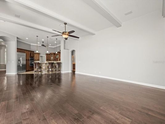 Empty room, Interior, Kitchen, Pendant Lights, Recessed Lighting, Stainless Steel Appliances, Wood Texture Flooring