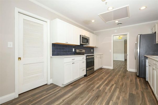 Interior, Kitchen, Pendant Lights, Recessed Lighting, Stainless Steel Appliances, Wood Texture Flooring