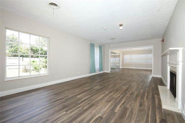 Empty room, Fireplace, Interior, Recessed Lighting, Wood Texture Flooring