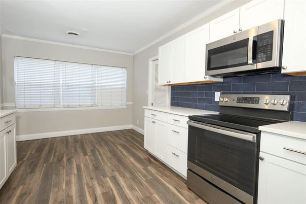 Interior, Kitchen, Pendant Lights, Stainless Steel Appliances, Wood Texture Flooring