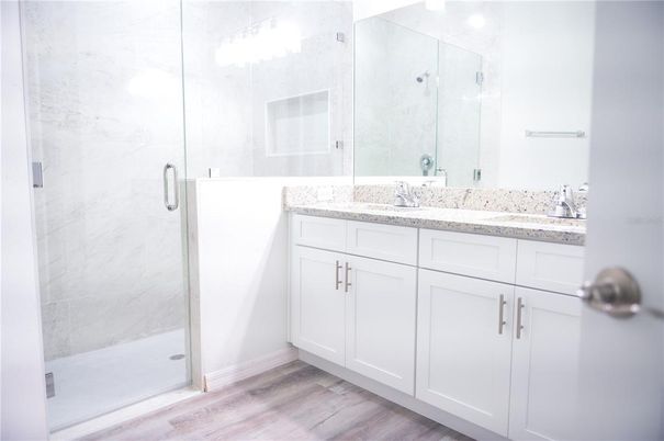 Bathroom, Glass Shower, Interior, Marble Walls, Wood Texture Flooring