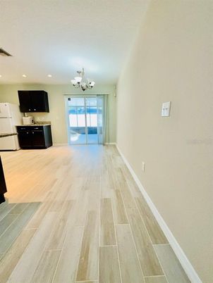 Chandelier, Empty room, Interior, Recessed Lighting, Wood Texture Flooring