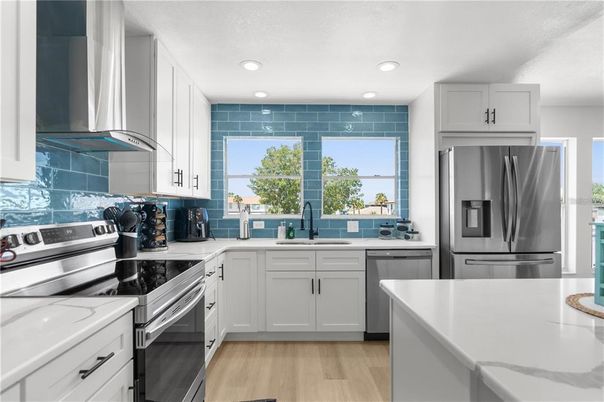 Interior, Kitchen, Recessed Lighting, Stainless Steel Appliances, Wood Texture Flooring