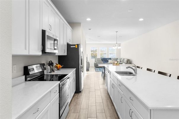 Dining room, Interior, Kitchen, Living room, Pendant Lights, Recessed Lighting, Wood Texture Flooring