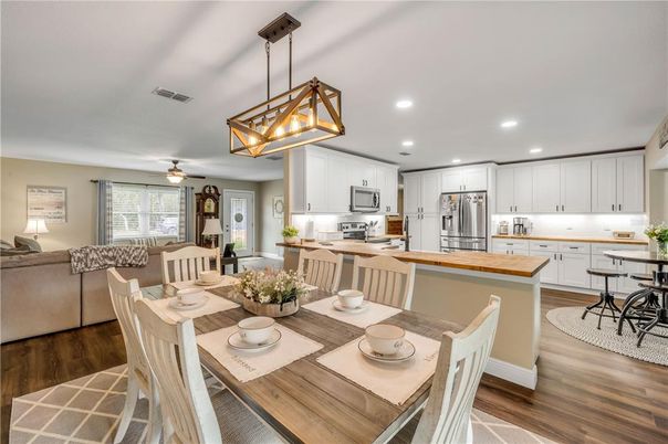 Dining room, Interior, Kitchen, Living room, Pendant Lights, Recessed Lighting, Stainless Steel Appliances, Wood Texture Flooring