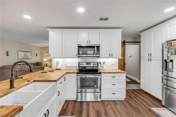 Interior, Kitchen, Recessed Lighting, Stainless Steel Appliances, Wood Texture Flooring