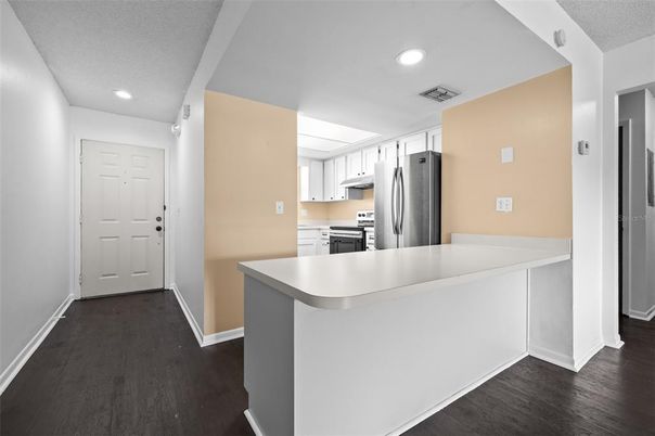 Interior, Kitchen, Recessed Lighting, Stainless Steel Appliances, Wood Texture Flooring