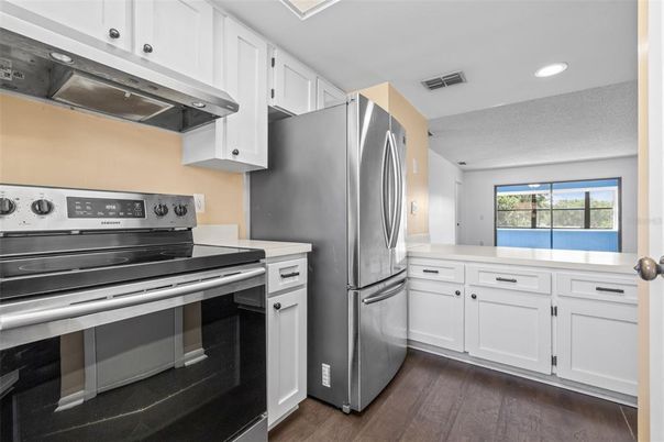 Interior, Kitchen, Recessed Lighting, Stainless Steel Appliances, Wood Texture Flooring
