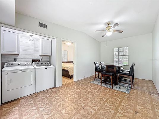 Bedroom, Dining room, Interior, Washer, Wood Texture Flooring