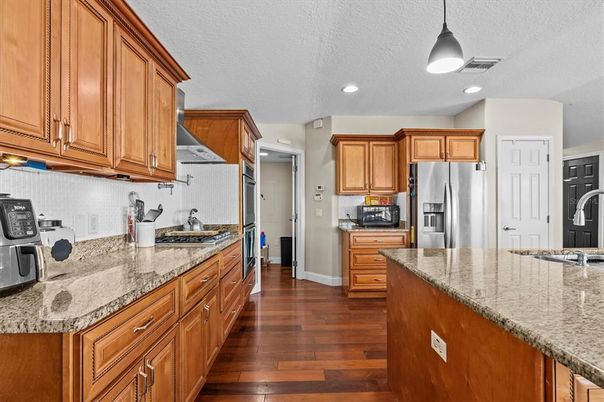Interior, Kitchen, Pendant Lights, Recessed Lighting, Stainless Steel Appliances, Wood Texture Flooring