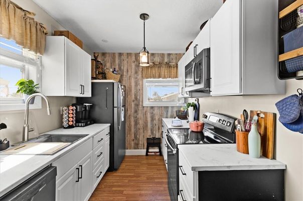 Interior, Kitchen, Pendant Lights, Stainless Steel Appliances, Wood Texture Flooring, Wooden Walls