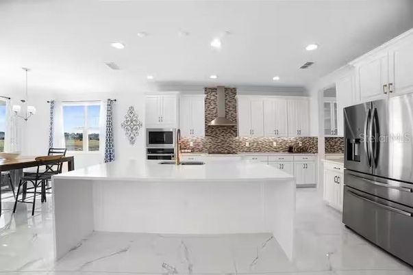 Dining room, Interior, Kitchen, Marble, Pendant Lights, Recessed Lighting, Stainless Steel Appliances