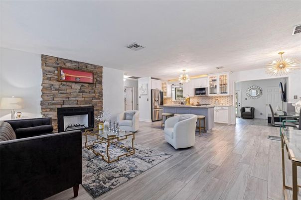 Fireplace, Interior, Kitchen, Living room, Pendant Lights, Stone Walls, Wood Texture Flooring