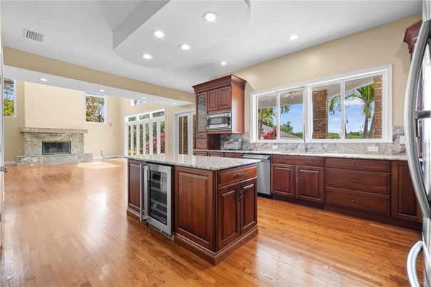 Fireplace, Interior, Kitchen, Recessed Lighting, Wood Texture Flooring