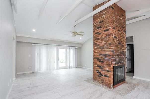 Empty room, Fireplace, Interior, Marble, Recessed Lighting, Stone Walls