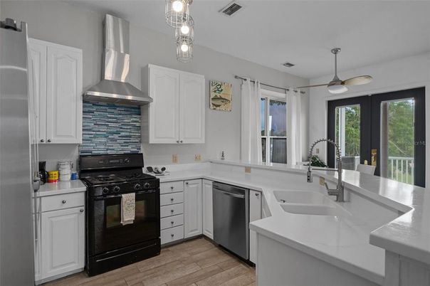 Interior, Kitchen, Pendant Lights, Stainless Steel Appliances, Wood Texture Flooring