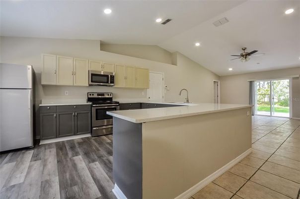 Interior, Kitchen, Recessed Lighting, Stainless Steel Appliances, Wood Texture Flooring