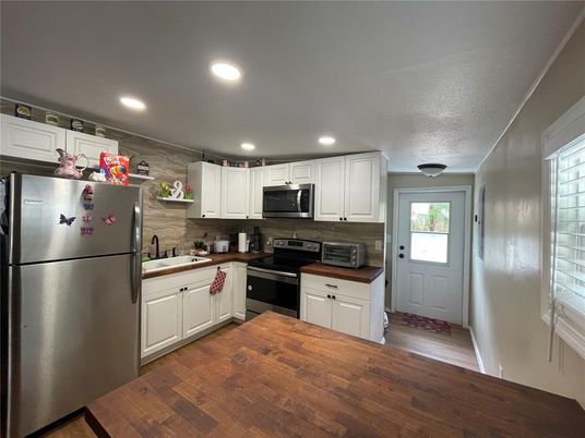 Interior, Kitchen, Recessed Lighting, Stainless Steel Appliances, Wood Texture Flooring