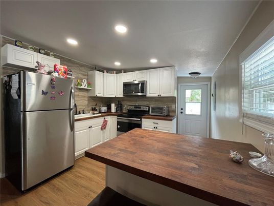 Interior, Kitchen, Recessed Lighting, Stainless Steel Appliances, Wood Texture Flooring