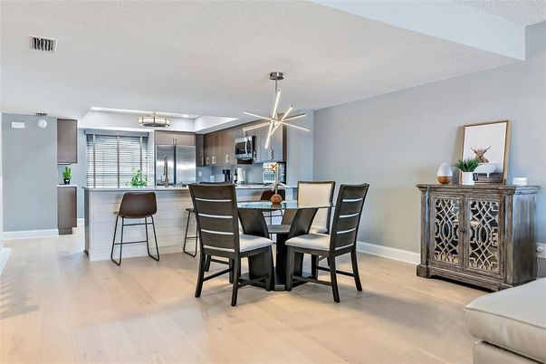 Dining room, Interior, Kitchen, Pendant Lights, Stainless Steel Appliances, Wood Texture Flooring