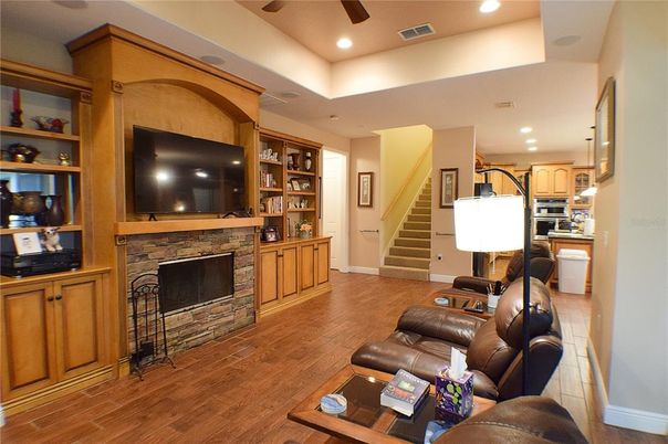 Fireplace, Interior, Kitchen, Living room, Recessed Lighting, Wood Texture Flooring