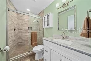 Bathroom, Glass Shower, Interior, Recessed Lighting, Wood Texture Flooring