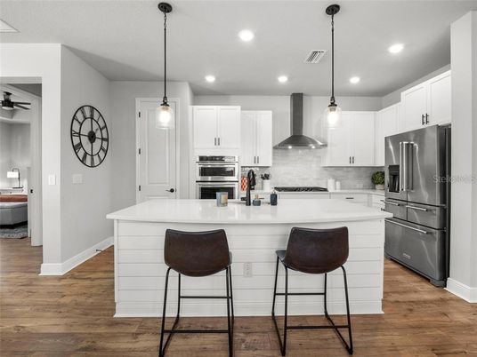 Interior, Kitchen, Pendant Lights, Recessed Lighting, Stainless Steel Appliances, Wood Texture Flooring
