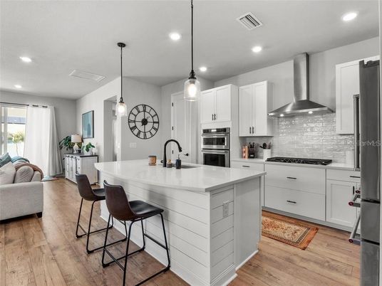 Interior, Kitchen, Pendant Lights, Recessed Lighting, Stainless Steel Appliances, Wood Texture Flooring