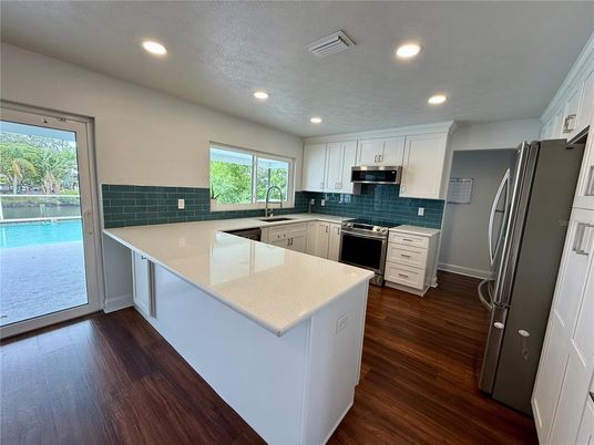 Interior, Kitchen, Recessed Lighting, Stainless Steel Appliances, Wood Texture Flooring