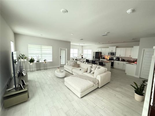 Dining room, Interior, Kitchen, Living room, Pendant Lights, Recessed Lighting, Stainless Steel Appliances, Wood Texture Flooring